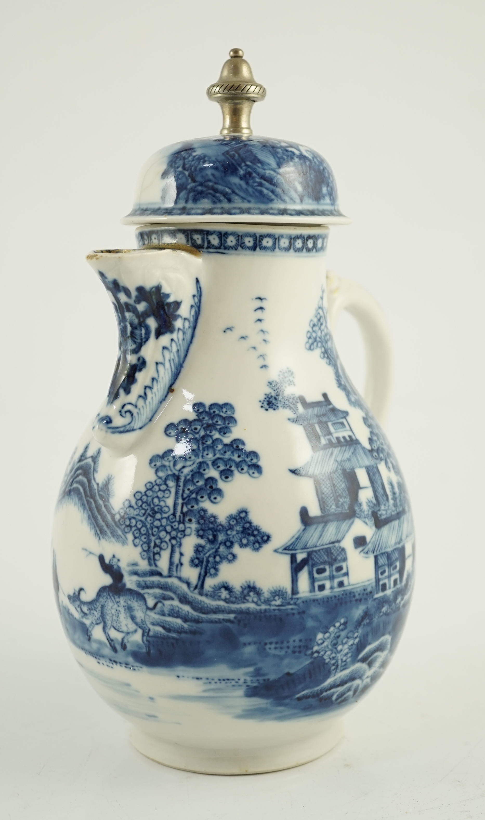 A Chinese blue and white jug and cover, Qianlong period, later metal finial